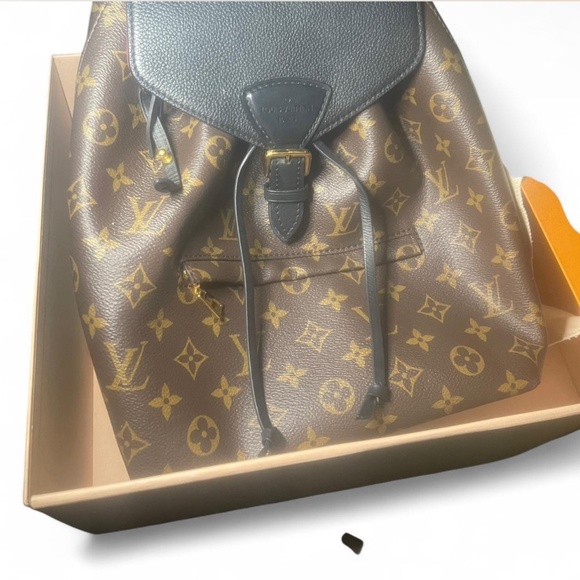 This authentic Louis Vuitton Montsouris backpack - Picture 1 of 3